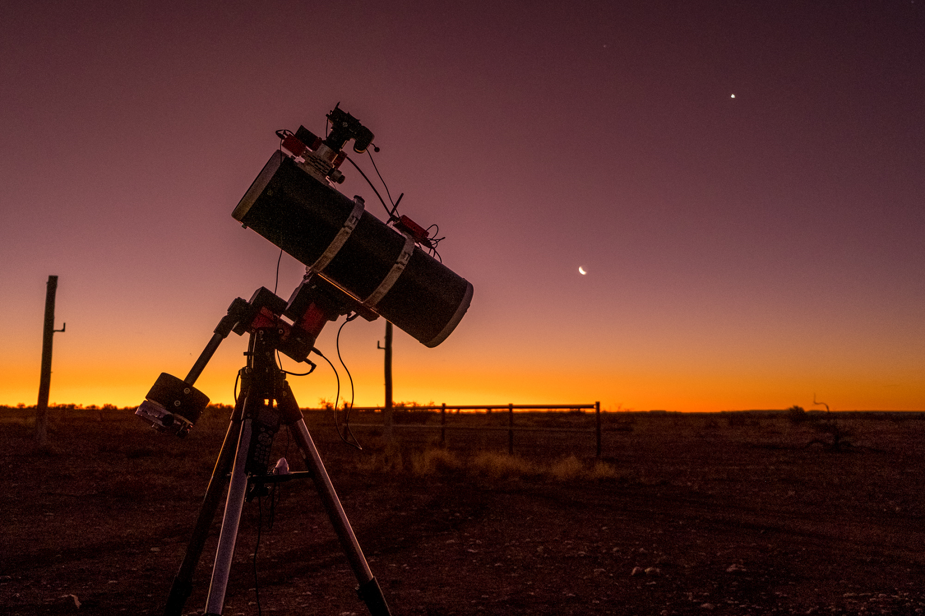 Telescope against the sunsetting for stargazing in Gascoyne Junction